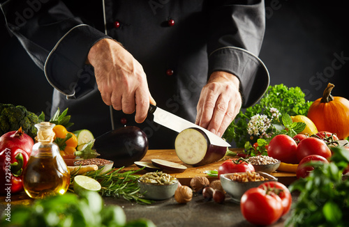 Chef preparing healthy vegetarian cuisine photo