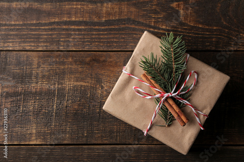 New Year. Christmas. Holidays. Composition with new year and christmas gifts on brown wooden background. view from above