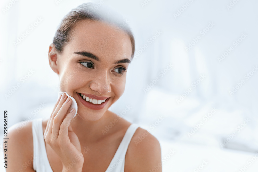 Makeup Remove. Girl Cleaning Face Skin With Cosmetic Pad Makeup Remove. Girl Cleaning Face Skin With Cosmetic Pad