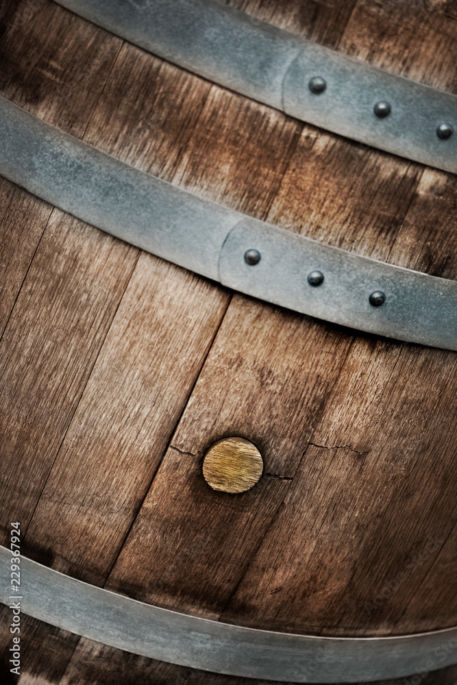 Details of an oak wooden barrel in a winery