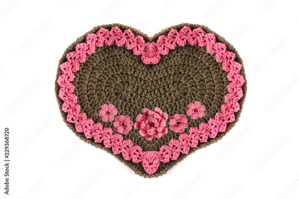 crochet Gingerbread heart shape valentines day gift with copy space on white isolated background crochet Gingerbread heart shape valentines day gift with copy space on white isolated background