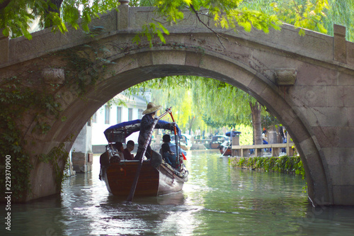 Photography Traditional chinese boats in Zhouzhuang old chinese village near Shanghai