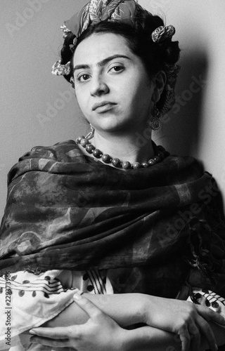 Portrait of a woman in the image of Frida Kahlo photo