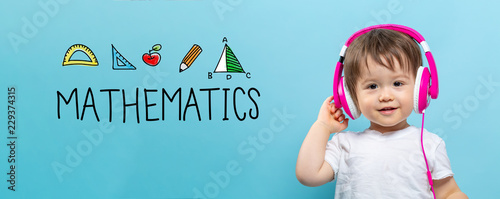 Mathmatics with toddler boy with headphones on a blue background