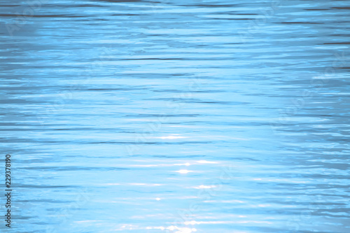 water surface. waves and ripples. toned background.