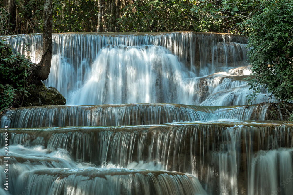Close up of Huay Maekamin Waterfall Tier 1 (Dong Wan or Herb Jungle) in Kanchanaburi, Thailand; photo by long exposure with slow speed shutter