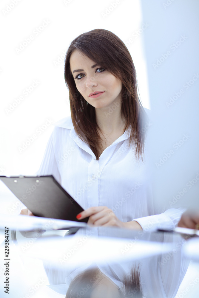 portrait of modern business woman with documents. portrait of modern business woman with documents.