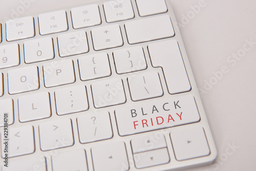 close-up shot of computer keyboard with black friday button