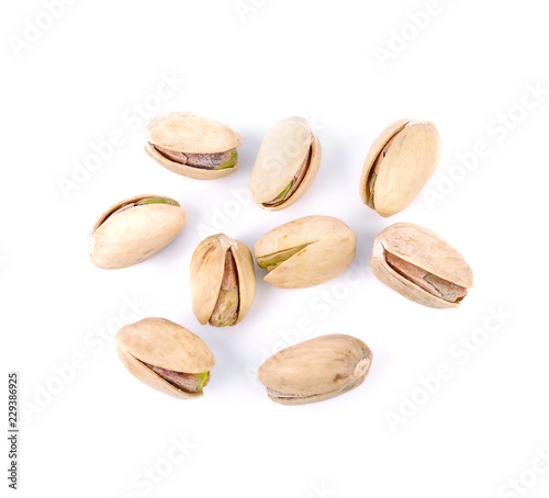 Pistachio nuts on a white background.