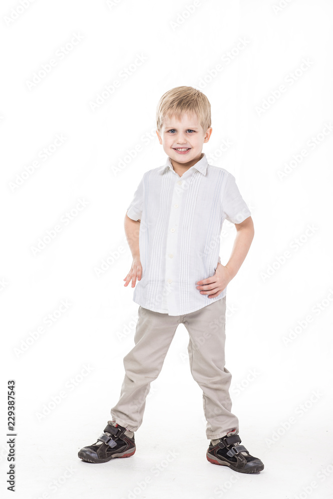 portrait of a happy five year old boy on white background portrait of a happy five year old boy on white background