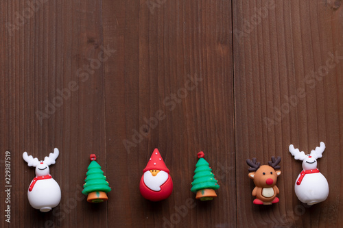 Cute Christmas Ornaments on wooden background