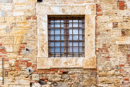 Window with bars on a wall