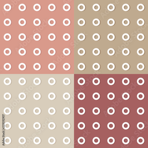 White ringlets on a pastel background. Set of four seamless patterns. Light background colors.
