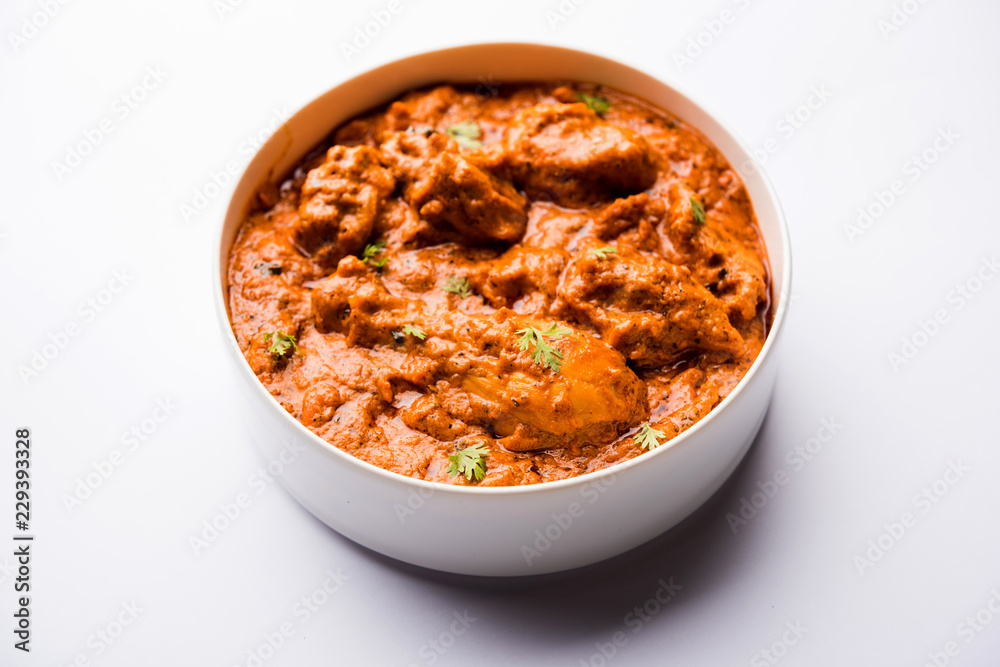Murgh Makhani / Butter chicken tikka masala served with roti / Paratha and plain rice along with