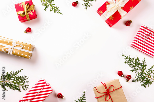 Christmas mood concept. Layout composition with traditional festive attributes  green decorative fresh pine tree branches. Winter holidays season. Background  copy space  close up  top view  flat lay.