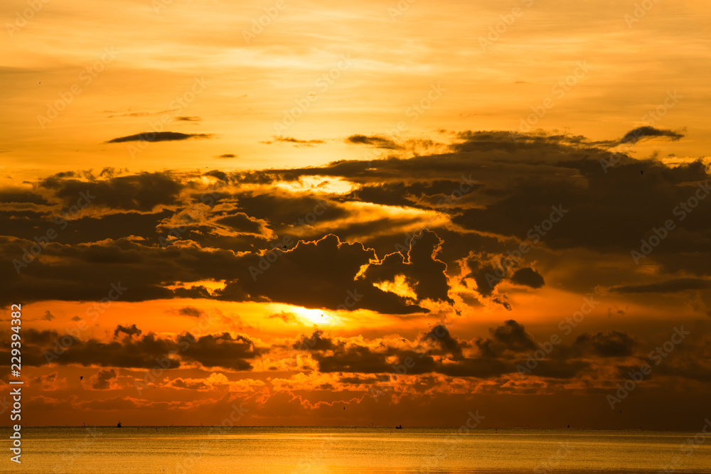 Black rain is blocking sunrise in the sea. Black rain is blocking sunrise in the sea.