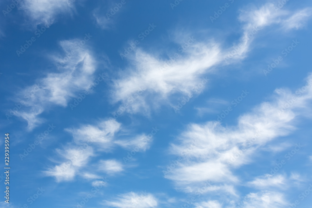 Beautiful blue sky with whispy white clouds - cirrus