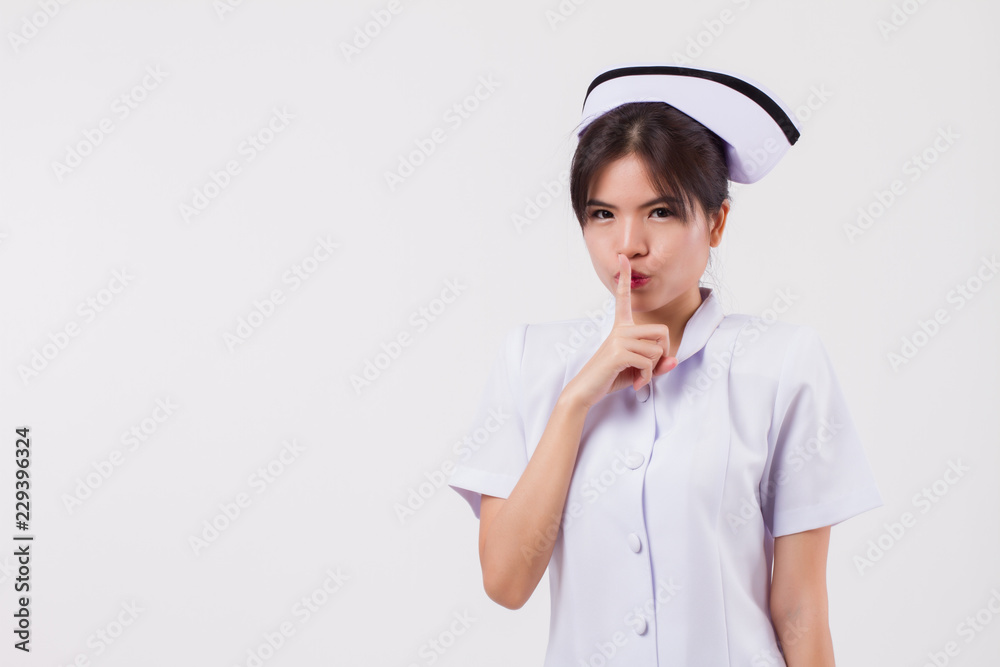 woman nurse asking for silence, quietness, order; concept of quiet and  silent hospital or clinic, no noise, no sound Stock Photo | Adobe Stock