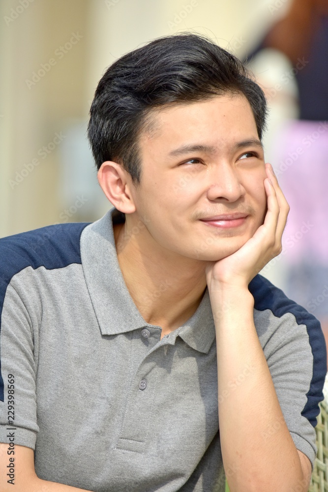 Chinese Teenager Boy Thinking Chinese Teenager Boy Thinking