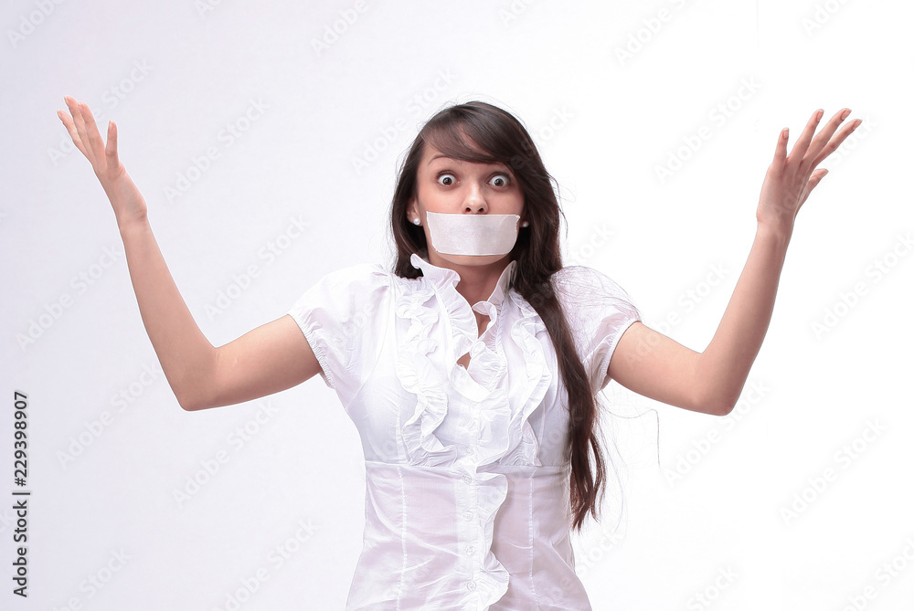 portrait of young business woman with taped mouth portrait of young business woman with taped mouth