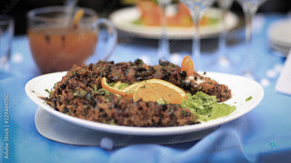 rice pilaf with meat and vegetables on the holiday table rice pilaf with meat and vegetables on the holiday table