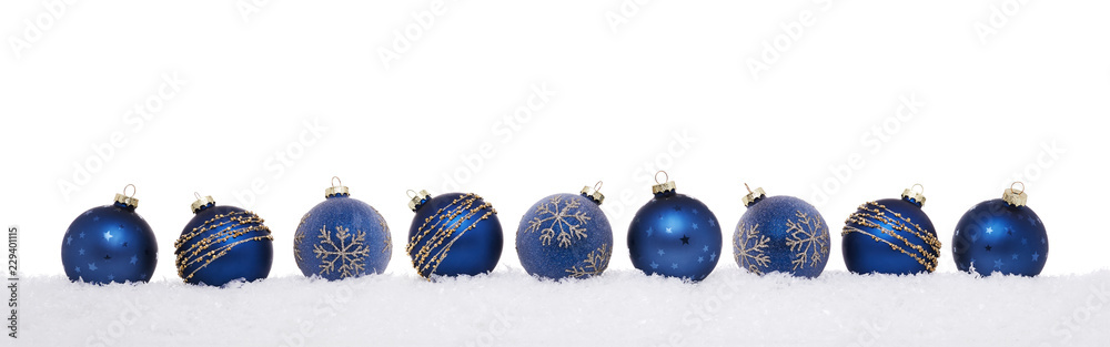 Blue christmas balls in a row isolated on snow, Christmas decoration