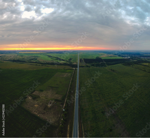 View of the track and fields at dawn with quadrocopter