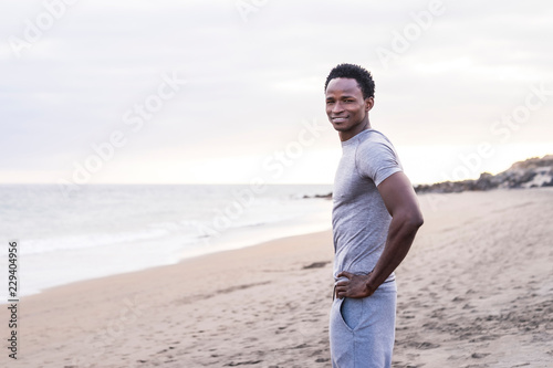 Black race african ethnic young man standing and rest after a sport training fitness session of exercises and workout. Beautiful body with muscles for healthy and active lifestyle