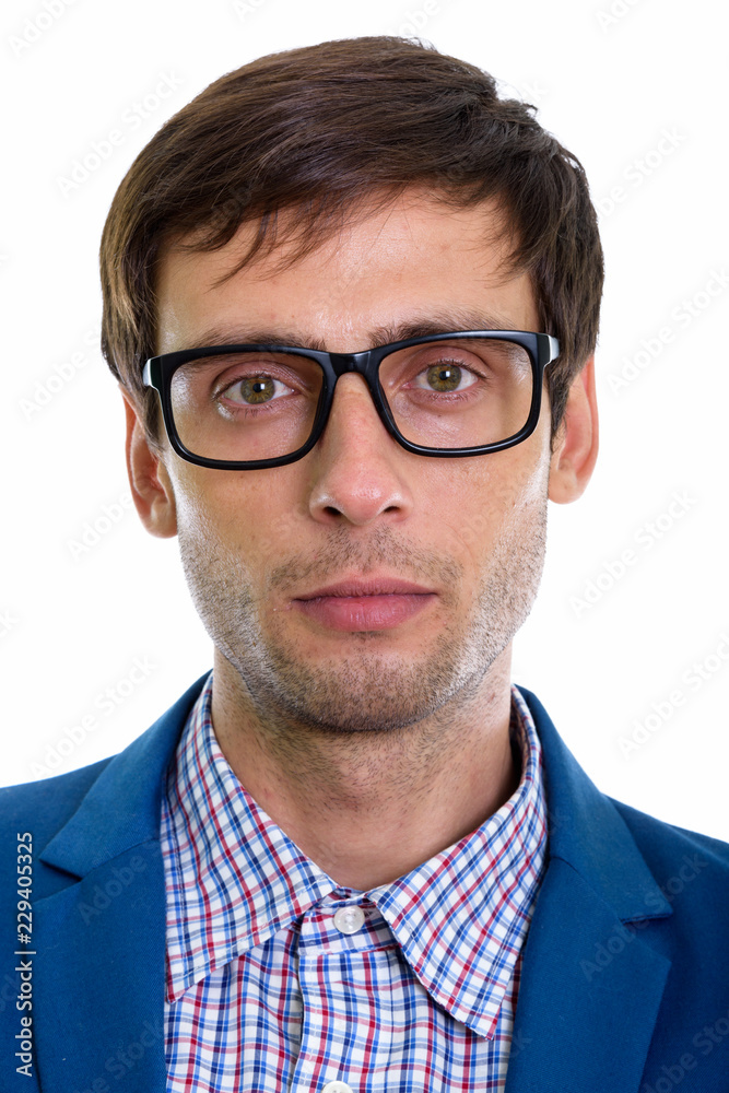 Face of young handsome businessman wearing eyeglasses Face of young handsome businessman wearing eyeglasses