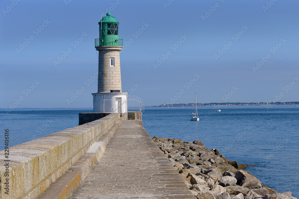 Lighthouse of Trehic and jetty at Le Croisic, a commune in the Loire-Atlantique department in western France