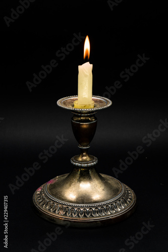 Candle holder isolated in dark background