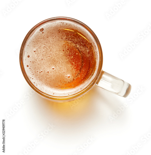 Slika na platnu top view of mug of lager beef isolated on white background