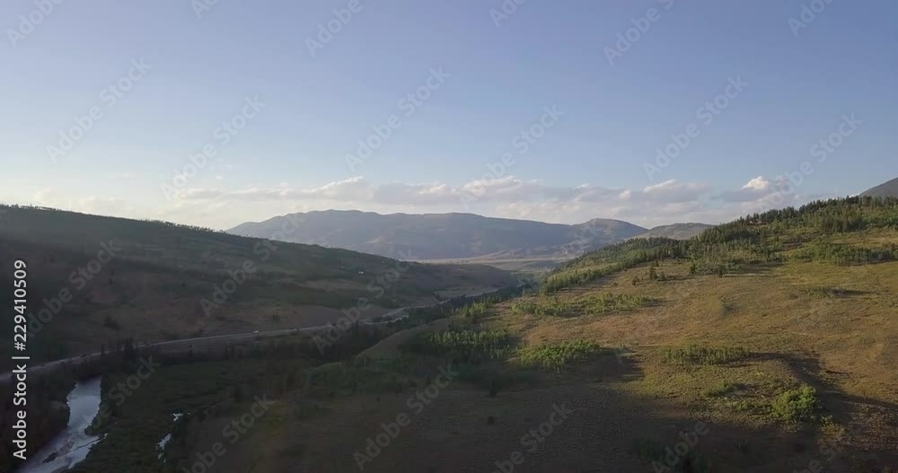 Aerial Shot Panning Slowly Across Mountain Valley