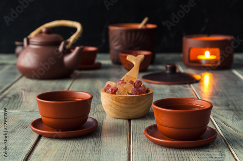 Tea ceremony, tea drinking with pottery. Concept of a cozy evening in a family restaurant