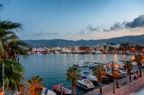 Fototapeta Naklejka Na Ścianę i Meble -  The capital of the island of Kos, Greece, view of the city and marina at sunset, a popular destination for travel in Europe