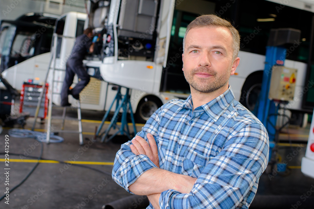 garage manager posing garage manager posing