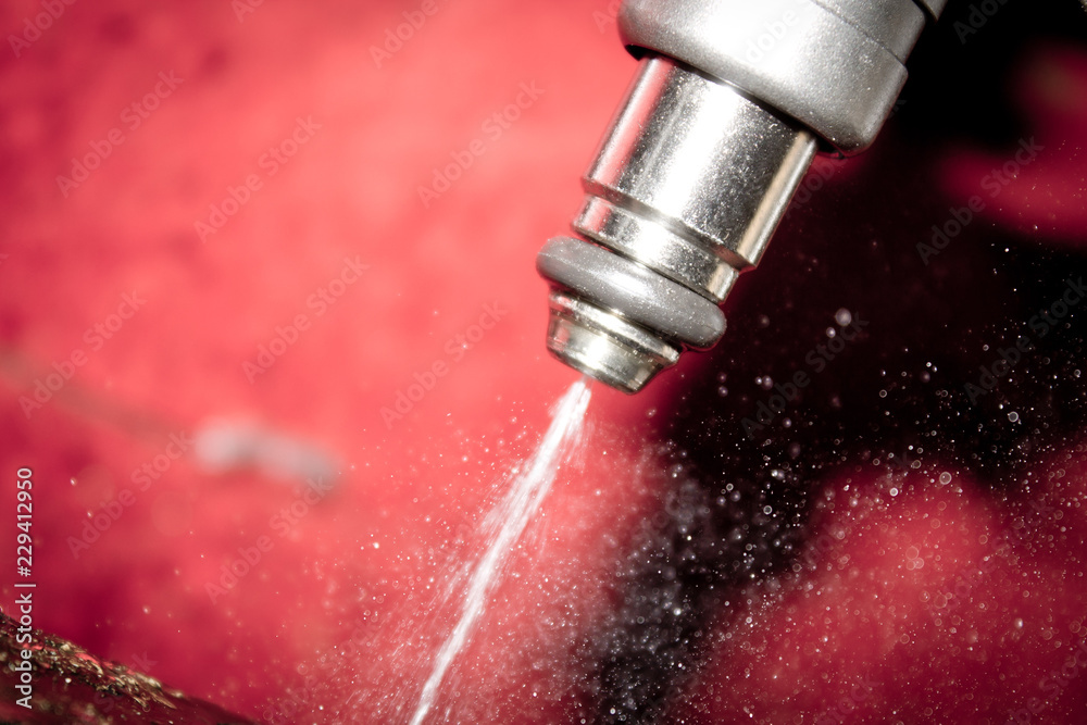 Fotografie fuel injector in action