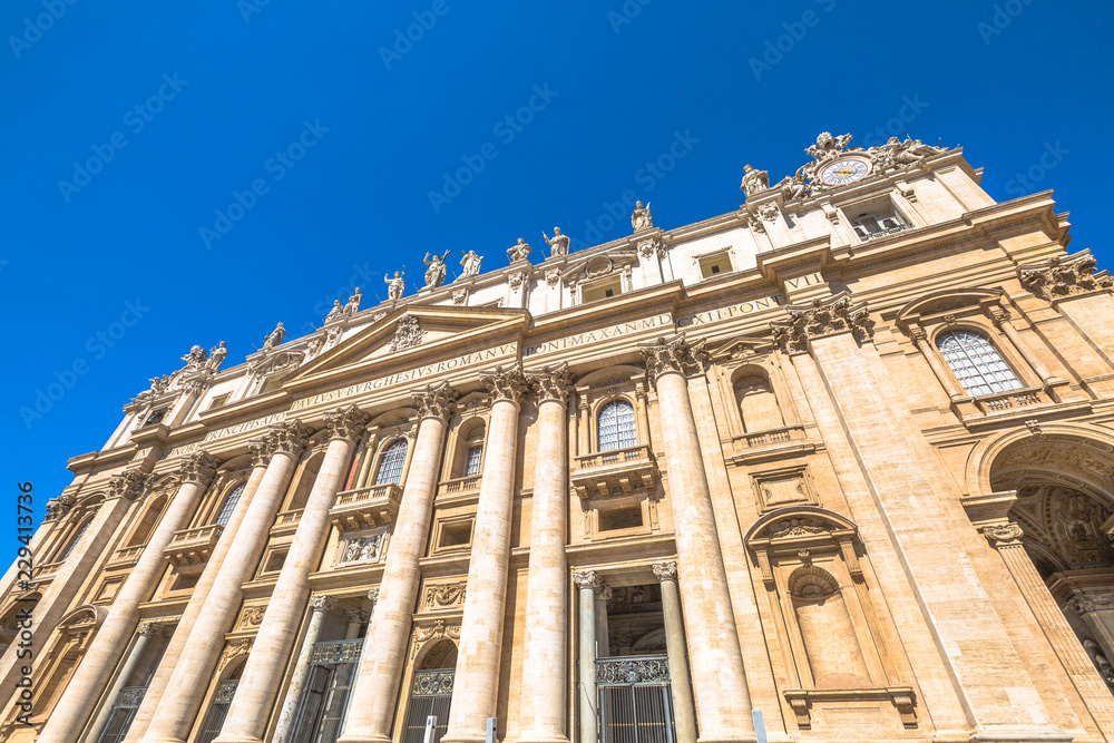 Rome, Italy - June 18, 2016: Close up of facade of Basilica di San Pietro, Vatican City in Rome, Italy.