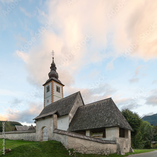 Old church in the village of Stara Fuzina, Slovenia photo