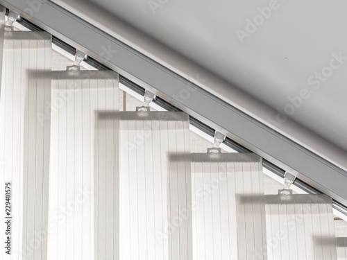 close up of white window blind at home