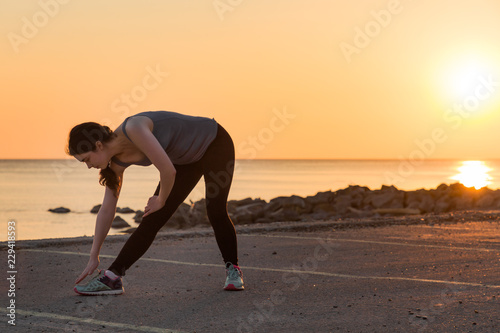 Women fitness on the beach