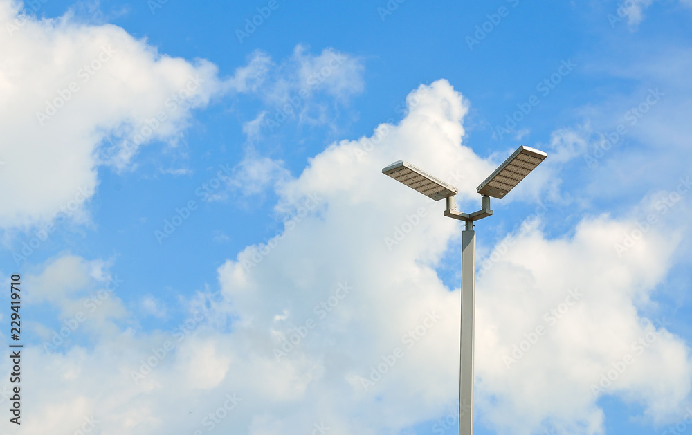 LED street lamps with energy-saving technology, cloud on sky background LED street lamps with energy-saving technology, cloud on sky background