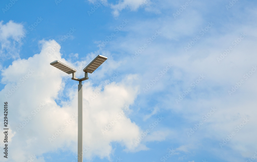 LED street lamps with energy-saving technology, cloud on sky background LED street lamps with energy-saving technology, cloud on sky background