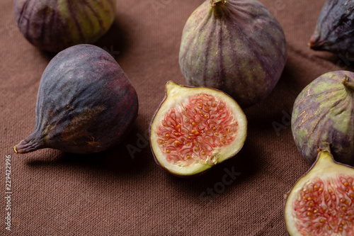 Fresh figs on brown backdrop