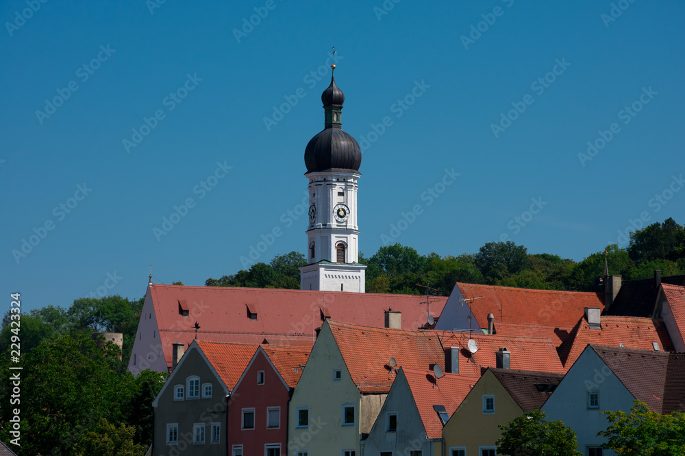Red tiled roof houses and Maria Himmelfahrt Church tower. Landsberg am Lech, Germany