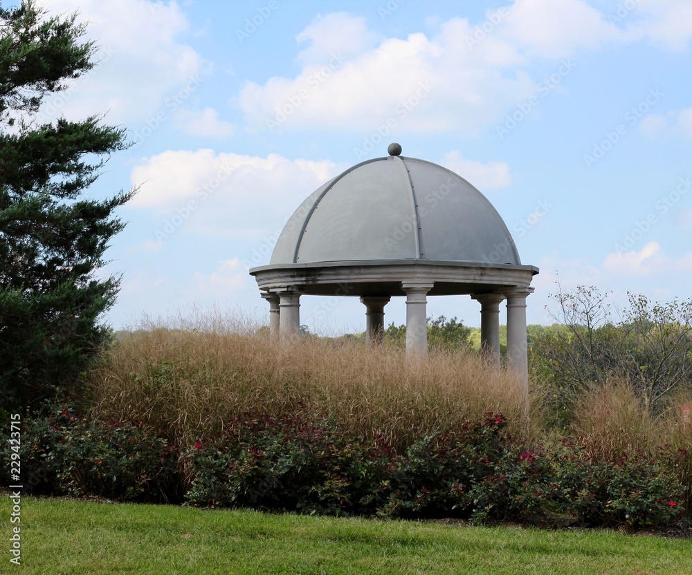 The top of the dome of the cement gazebo in the park. The top of the dome of the cement gazebo in the park.