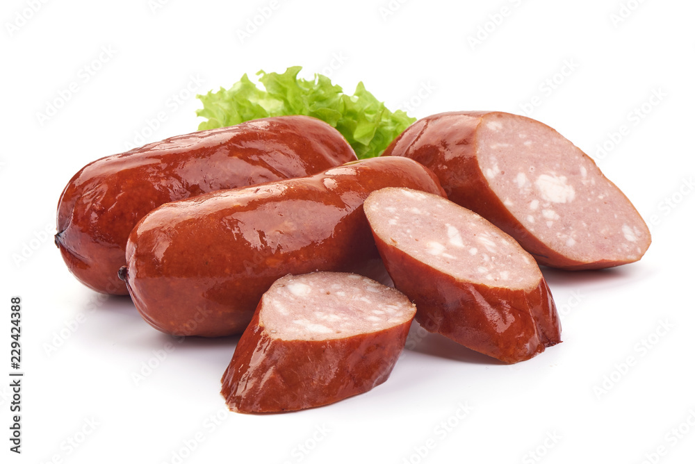 Hungarian or German grilled sliced sausages. Isolated on a white background. Close-up Hungarian or German grilled sliced sausages. Isolated on a white background. Close-up