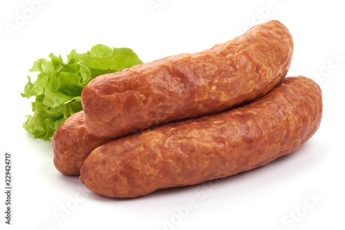 Tasty Dried Sausages with lettuce, Close-up, isolated on a white background.
