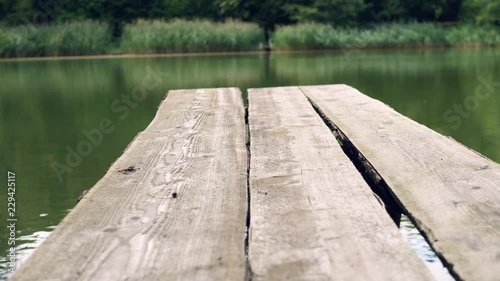 a boat dock on a small lake