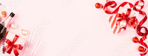 Christmas gift on pink background.